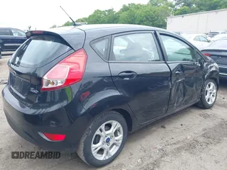 2014 Ford Fiesta SE z VIN 3FADP4EJ3EM205098, wystawiony jako IAAI lot #42371316 z przebiegiem 130 420 mil mil oraz . Historia ofert i sprzedaży dostępna na DreamBid. Obrazek 4.