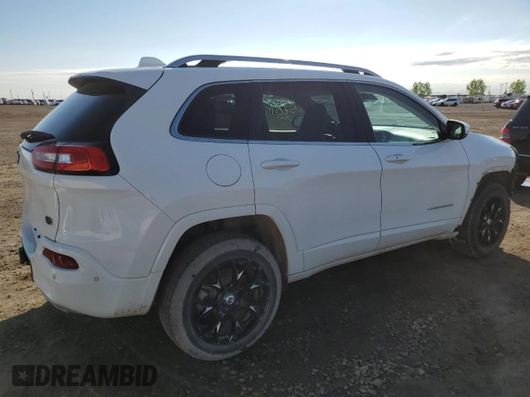 2017 Jeep Cherokee Overland с VIN 1C4PJMJS1HW594870, выставлен на аукционе Copart как лот 57781865 с пробегом 165 859 миль миль и Списание • Salvage title. История ставок и продаж доступна на DreamBid. Изображение 3.