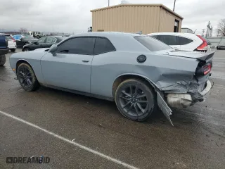 2021 Dodge Challenger GT with VIN 2C3CDZKG6MH677625, listed as a Copart auction lot 83852614 with 44,965 mi miles and Salvage Title. Bid and sale history available at carsss.com. Image 2.