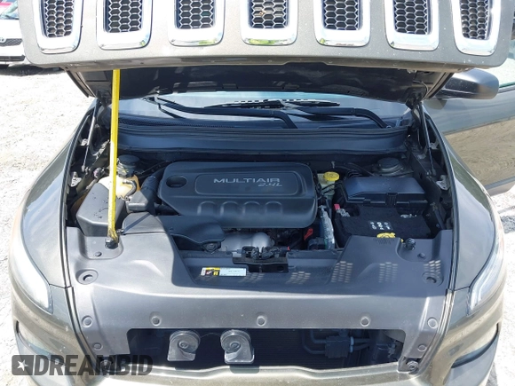 2015 Jeep Cherokee Sport with VIN 1C4PJLAB0FW660722, listed as a IAAI auction lot 42480650 with 272,396 mi miles and . Bid and sale history available at DreamBid. Image 10.