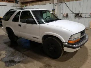 1999 Chevrolet Blazer LS with VIN 1GNCT18W5XK136973, listed as a Copart auction lot 60284865 with 199,759 mi miles and Clean title. Bid and sale history available at DreamBid. Image 4.