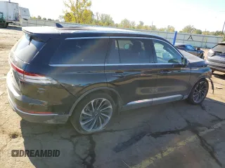 2022 Lincoln Aviator Reserve z VIN 5LM5J7XC9NGL11154, wystawiony jako Copart lot #75211154 z przebiegiem 31 869 mil mil oraz Szkoda całkowita • Salvage title. Historia ofert i sprzedaży dostępna na DreamBid. Obrazek 3.