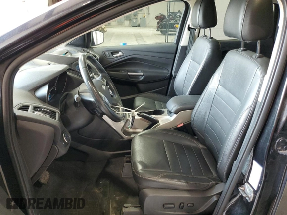2013 Ford Escape SEL with VIN 1FMCU0H98DUD50796, listed as a Copart auction lot 64014515 with 209,791 mi miles and Salvage title. Bid and sale history available at DreamBid. Image 7.