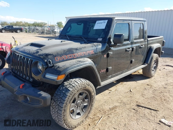 2022 Jeep Gladiator Mojave with VIN 1C6JJTEG7NL180485, listed as a IAAI auction lot 41030779 with 41,445 mi miles and . Bid and sale history available at DreamBid. Image 2.