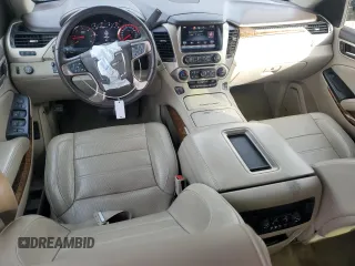 2015 GMC Yukon Denali with VIN 1GKS1CKJ1FR303049, listed as a Copart auction lot 82435514 with 100,693 mi miles and Salvage Title. Bid and sale history available at carsss.com. Image 8.