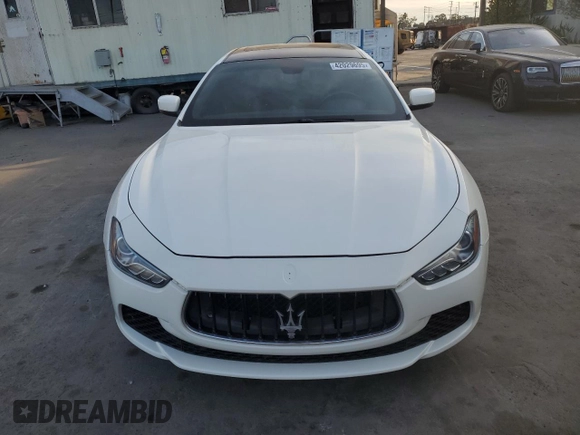 2014 Maserati Ghibli z VIN ZAM57XSA6E1097525, wystawiony jako Copart lot #42029695 z przebiegiem 93 740 mil mil oraz Szkoda całkowita • Salvage title. Historia ofert i sprzedaży dostępna na DreamBid. Obrazek 5.