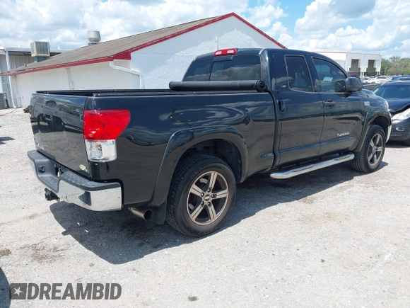 2012 Toyota Tundra z VIN 5TFRY5F17CX128888, wystawiony jako IAAI lot #42508395 z przebiegiem 279 524 mil mil oraz . Historia ofert i sprzedaży dostępna na DreamBid. Obrazek 4.