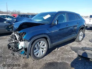 2021 Volkswagen Atlas Cross Sport 3.6L V6 SE w/Technology with VIN 1V2JE2CA5MC206701, listed as a IAAI auction lot 41165558 with 52,631 mi miles. Bid and sale history available at carsss.com. Image 2.
