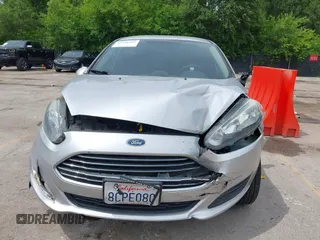2018 Ford Fiesta SE z VIN 3FADP4BJ6JM106855, wystawiony jako IAAI lot #42491262 z przebiegiem 166 397 mil mil oraz . Historia ofert i sprzedaży dostępna na DreamBid. Obrazek 6.