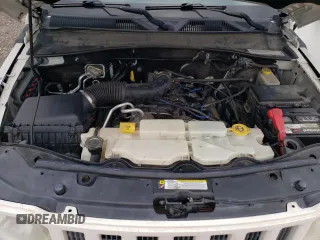 2010 Jeep Liberty Sport with VIN 1J4PP2GK9AW133958, listed as a Copart auction lot 47265675 with 124,466 mi miles and Salvage Title. Bid and sale history available at DreamBid. Image 12.