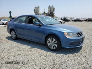 2015 Volkswagen Jetta SE with VIN 3VWD17AJ1FM421162, listed as a Copart auction lot 63873695 with 191,976 mi miles and Salvage title. Bid and sale history available at DreamBid. Image 4.