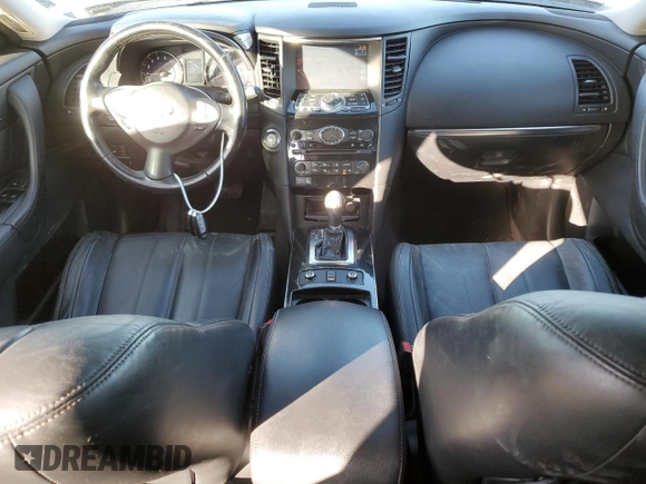 2015 Infiniti QX70 z VIN JN8CS1MW6FM483141, wystawiony jako Copart lot #44126235 z przebiegiem 174 034 mil mil oraz Czysty tytuł • Clean title. Historia ofert i sprzedaży dostępna na DreamBid. Obrazek 8.