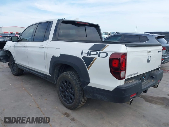 2023 Honda Ridgeline Black Edition with VIN 5FPYK3F84PB011792, listed as a IAAI auction lot 42049593 with 21,002 mi miles and . Bid and sale history available at DreamBid. Image 3.
