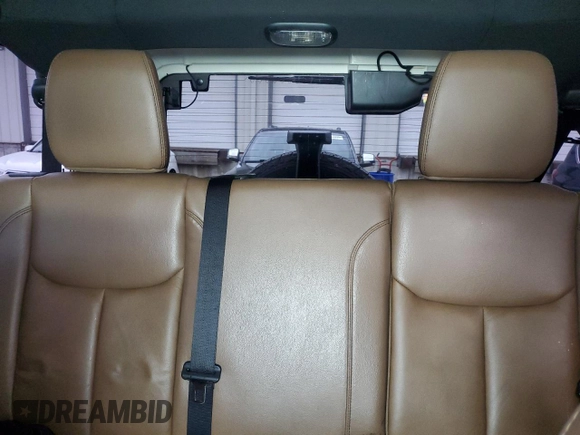 2013 Jeep Wrangler Unlimited Moab with VIN 1C4BJWEG6DL583841, listed as a Copart auction lot 52487915 with 130,369 mi miles and Salvage title. Bid and sale history available at DreamBid. Image 10.