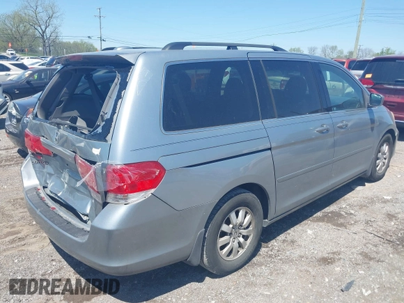 2010 Honda Odyssey EX-L with VIN 5FNRL3H62AB001954, listed as a IAAI auction lot 42028959 with 142,743 mi miles. Bid and sale history available at carsss.com. Image 4.