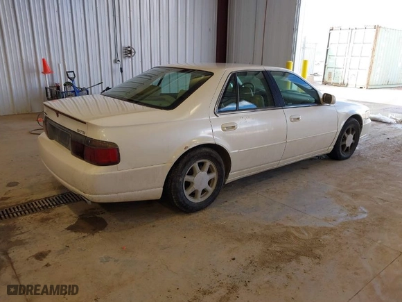 1998 Cadillac Seville Touring STS with VIN 1G6KY5493WU908261, listed as a IAAI auction lot 41933423 with NaN miles. Bid and sale history available at carsss.com. Image 4.