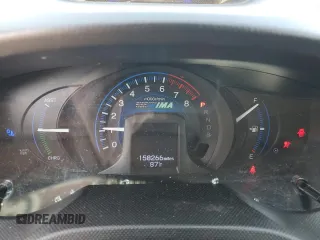 2012 Honda Insight EX z VIN JHMZE2H77CS002907, wystawiony jako Copart lot #52040465 z przebiegiem 158 266 mil mil oraz Szkoda całkowita • Salvage title. Historia ofert i sprzedaży dostępna na DreamBid. Obrazek 9.