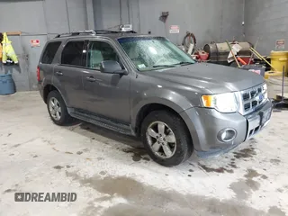 2012 Ford Escape Limited with VIN 1FMCU9EGXCKA96624, listed as a IAAI auction lot 42205141 with 163,223 mi miles. Bid and sale history available at carsss.com. Image 1.