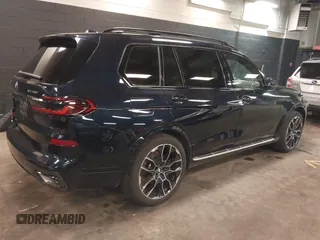 2025 BMW X7 xDrive40i with VIN 5UX23EM02S9X10070, listed as a IAAI auction lot 41735838 with 5,523 mi miles. Bid and sale history available at carsss.com. Image 4.