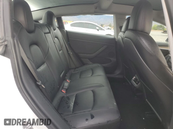 2023 Tesla Model 3 with VIN 5YJ3E1EA9PF450392, listed as a Copart auction lot 48534385 with 36,829 mi miles and Salvage Title. Bid and sale history available at DreamBid. Image 11.