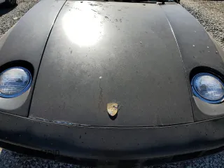 1985 Porsche 928 z VIN WP0JB0928FS861121, wystawiony jako Copart lot #76747554 z przebiegiem 73 056 mil mil oraz Tytuł czysty. Historia ofert i sprzedaży dostępna na DreamBid. Obrazek 11.