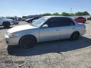 2002 Toyota Corolla CE with VIN 1NXBR12E22Z599911, listed as a Copart auction lot 56417635 with 214,976 mi miles and Salvage title. Bid and sale history available at DreamBid. Image 1.