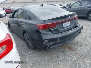 2023 Kia Forte GT-Line z VIN 3KPF54AD8PE539617, wystawiony jako IAAI lot #41890617 z przebiegiem 26 855 mil mil oraz . Historia ofert i sprzedaży dostępna na DreamBid. Obrazek 3.