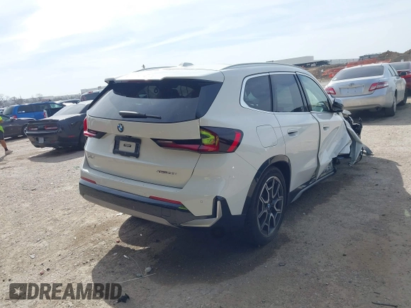 2023 BMW X1 xDrive28i with VIN WBX73EF07P5W32455, listed as a IAAI auction lot 41825701 with 12,453 mi miles and . Bid and sale history available at DreamBid. Image 4.