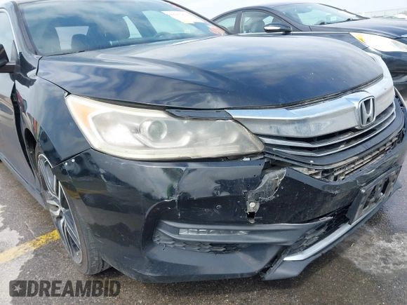 2016 Honda Accord Sport with VIN 1HGCR2F56GA129934, listed as a IAAI auction lot 41935822 with 140,608 mi miles and . Bid and sale history available at DreamBid. Image 18.