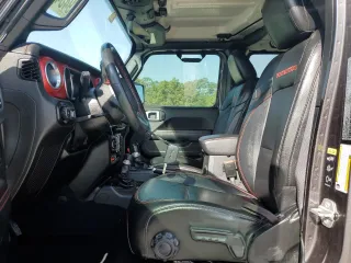 2021 Jeep Wrangler Unlimited Rubicon with VIN 1C4HJXFG6MW764208, listed as a Copart auction lot 49484545 with 47,345 mi miles and Salvage Title. Bid and sale history available at DreamBid. Image 7.