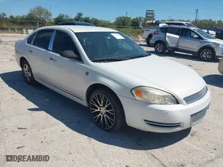 2013 Chevrolet Impala Police with VIN 2G1WD5E34D1227693, listed as a IAAI auction lot 41613853 with 163,891 mi miles. Bid and sale history available at carsss.com. Image 1.