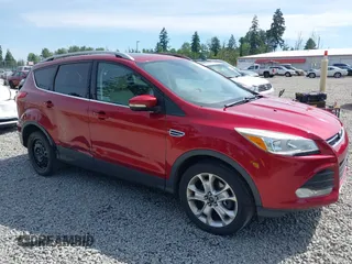 2015 Ford Escape Titanium with VIN 1FMCU9J93FUB28037, listed as a IAAI auction lot 42432345 with 133,242 mi miles and . Bid and sale history available at DreamBid. Image 6.