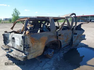 1999 Chevrolet Tahoe Z71 z VIN 1GNEK13R3XJ455517, wystawiony jako IAAI lot #39726972 z przebiegiem Nie podano mil oraz . Historia ofert i sprzedaży dostępna na DreamBid. Obrazek 4.