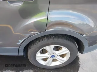 2015 Ford Escape SE with VIN 1FMCU0G75FUC20011, listed as a IAAI auction lot 42113751 with 182,516 mi miles. Bid and sale history available at carsss.com. Image 13.