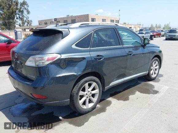 2010 Lexus RX 350 with VIN 2T2BK1BA8AC061209, listed as a IAAI auction lot 42105424 with 242,961 mi miles. Bid and sale history available at carsss.com. Image 4.