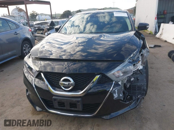 2018 Nissan Maxima SV with VIN 1N4AA6AP4JC398478, listed as a IAAI auction lot 41619733 with 132,867 mi miles and . Bid and sale history available at DreamBid. Image 13.
