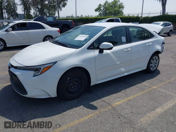 2024 Toyota Corolla Hybrid LE with VIN JTDBCMFE3RJ037223, listed as a IAAI auction lot 41978962 with 7,582 mi miles. Bid and sale history available at carsss.com. Image 2.