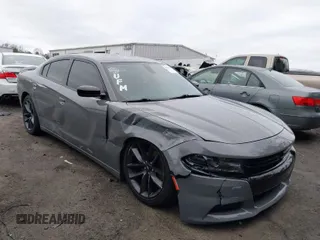 2019 Dodge Charger SXT with VIN 2C3CDXBG6KH667548, listed as a IAAI auction lot 41114669 with 112,233 mi miles. Bid and sale history available at carsss.com. Image 1.