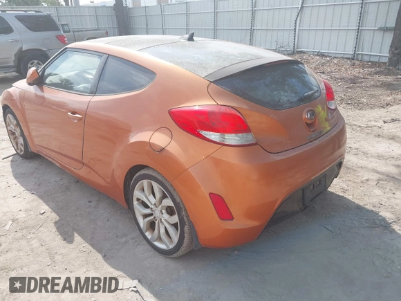2012 Hyundai Veloster w/Gray Int z VIN KMHTC6AD5CU074516, wystawiony jako IAAI lot #42061623 z przebiegiem 133 338 mil mil oraz . Historia ofert i sprzedaży dostępna na DreamBid. Obrazek 3.