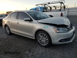 2012 Volkswagen Jetta Sedan SEL w/Sunroof with VIN 3VWLX7AJ7CM310458, listed as a Copart auction lot 87670525 with 142,944 mi miles and Salvage Title. Bid and sale history available at carsss.com. Image 4.