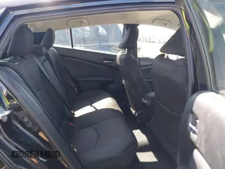 2021 Toyota Prius L Eco with VIN JTDKAMFU6M3135799, listed as a IAAI auction lot 42064241 with 77,120 mi miles and . Bid and sale history available at DreamBid. Image 8.