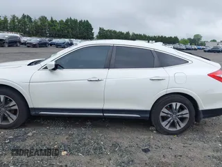 2015 Honda Crosstour EX-L z VIN 5J6TF1H5XFL000901, wystawiony jako IAAI lot #42147541 z przebiegiem 124 949 mil mil oraz . Historia ofert i sprzedaży dostępna na DreamBid. Obrazek 14.