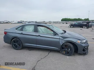 2022 Volkswagen Jetta SE with VIN 3VW7M7BU5NM000413, listed as a IAAI auction lot 42326437 with 61,385 mi miles and . Bid and sale history available at DreamBid. Image 14.