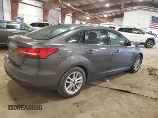 2018 Ford Focus SE with VIN 1FADP3F25JL249150, listed as a Copart auction lot 51837135 with 147,532 mi miles and Clean title. Bid and sale history available at DreamBid. Image 3.