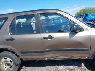 2002 Honda CR-V LX z VIN JHLRD78402C068542, wystawiony jako IAAI lot #42265409 z przebiegiem 205 650 mil mil oraz . Historia ofert i sprzedaży dostępna na DreamBid. Obrazek 13.