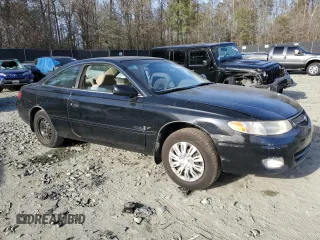 1999 Toyota Solara SE with VIN 2T1CG22P1XC195671, listed as a Copart auction lot 80575724 with 185,634 mi miles and Salvage Title. Bid and sale history available at DreamBid. Image 4.