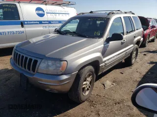 1999 Jeep Grand Cherokee Limited with VIN 1J4GW68N8XC770353, listed as a Copart auction lot 74670614 with Not provided miles and Non repairable. Bid and sale history available at DreamBid. Image 1.
