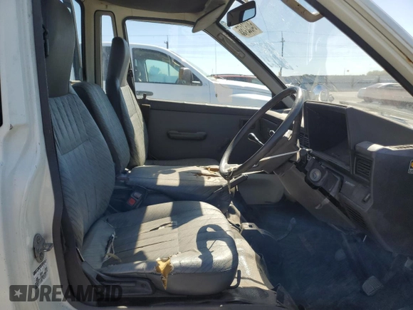 1994 Toyota Tacoma with VIN CM600012981, listed as a Copart auction lot 64052155 with 237,536 mi miles and Salvage title. Bid and sale history available at DreamBid. Image 7.