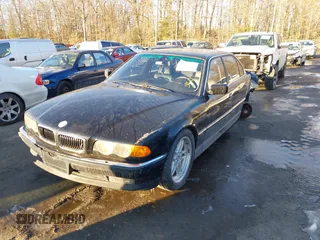 2000 BMW 7 Series 740iL with VIN WBAGH8345YDP12154, listed as a IAAI auction lot 41369212 with 210,094 mi miles. Bid and sale history available at carsss.com. Image 2.