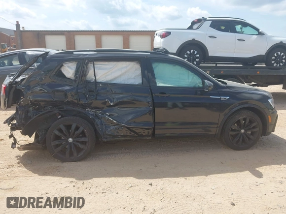 2021 Volkswagen Tiguan SE z VIN 3VV3B7AX5MM027369, wystawiony jako IAAI lot #42082821 z przebiegiem 74 024 mil mil oraz . Historia ofert i sprzedaży dostępna na DreamBid. Obrazek 13.
